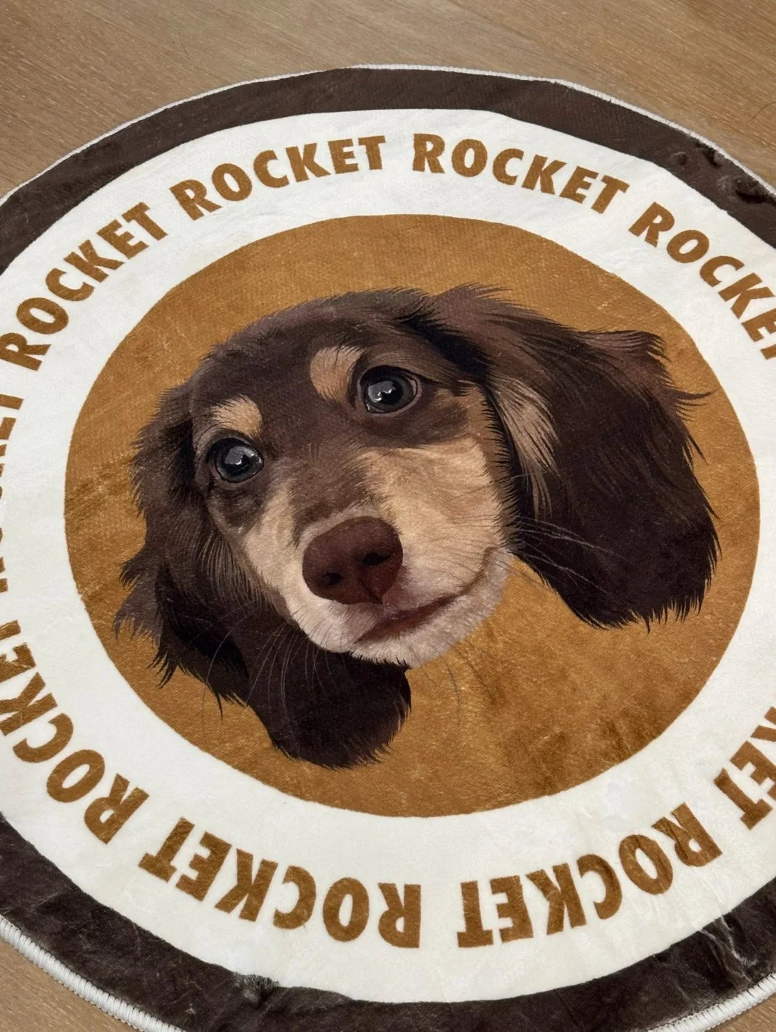 a customer's dog with their own portrait rug